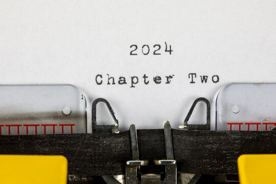 old typewriter with text 2024 chapter two	
