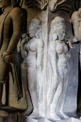 Big Hindu sculptures around the garbhagriha inside of Ellora Cave 29 (Dhumar Lena), Ellora, Maharashtra, India, Asia