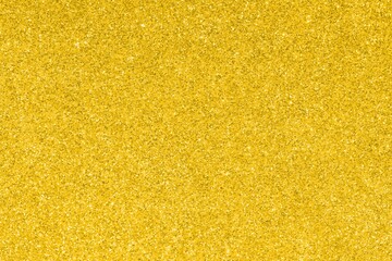 YELLOW GLITTER sparkling background with bright reflections and many lights