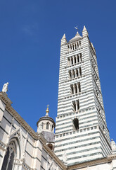Fototapeta na wymiar Bell Tower of the Cathedral of Siena in the Tuscany Region in Central Italy