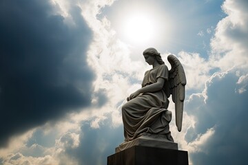 Angel statue on a square pedestal with dramatic sky in the background.
