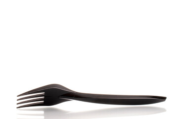 One plastic fork, macro, isolated on white background.