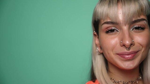 Informal female model with piercing on face