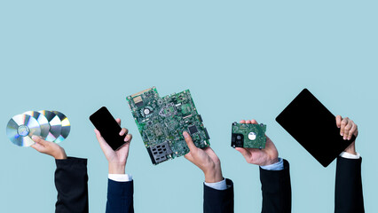 Panoramic banner hand holding electronic waste on isolated background. Eco-business recycle waste...