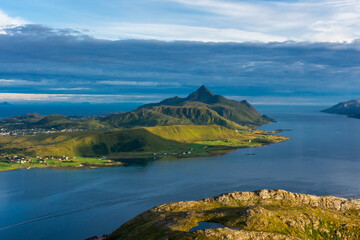 Beautiful landscape of the Lofoten Islands during the golden hour, view from Offersoy Mount trail,  Norway