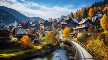 a historic mountain village in the midst of a colorful autumn, with golden leaves, half-timbered houses, and the warm embrace of fall frozen © ra0