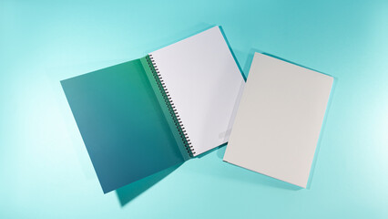 Mockup of an a4 open spiral notebook