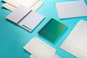 Mockups of paper envelopes and notepad without logo in different sizes