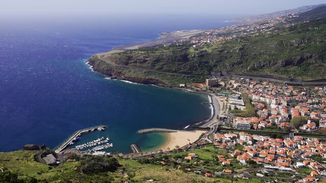 Magnificent view of a beautiful Praia de Machico beach in Madeira Island on sunny windy day