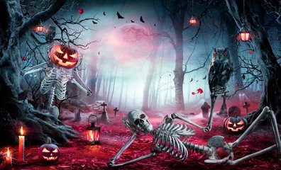 Foto auf Acrylglas Halloween - Skeletons In Spooky Forest At Moonlight - Jack O’ Lanterns  In Cemetery At Twilight © Romolo Tavani