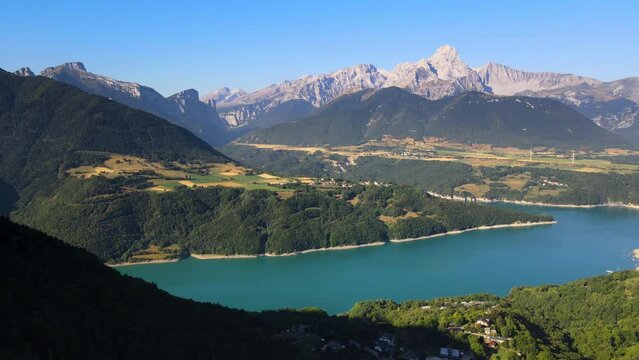 Aerial view of Sautet Lake and the higest point in the Devoluy mountain range, the Obiou peak. Isere, Alps, France