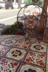 Ceramic tile. National ornament. Eastern motifs. Painted furniture. Painted tiles. Street cafe.