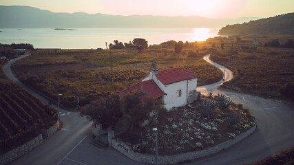 Drone photo of St. Cross church in the small town of Lumbarda on Korcula island, photographed...