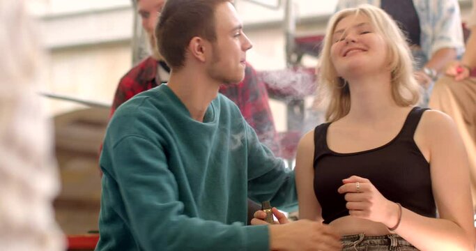 Kissing to express love, passion, desire between partners establish close emotional connection. Adolescents exhibit distinct behavior patterns within peer groups. Teenage Peer Behavior at school.