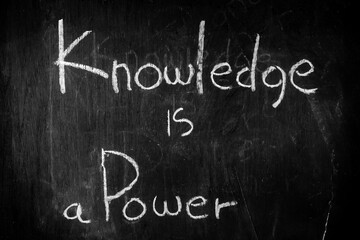Knowledge is a power text on a blackboard 