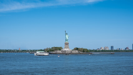 View of the Statue of Liberty, a colossal neoclassical sculpture on Liberty Island in New York...