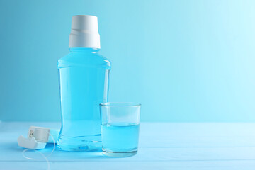 A mouthwash on a colored background. Dental care, dental health.