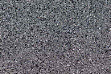 Background image of asphalt details seen straight ahead.