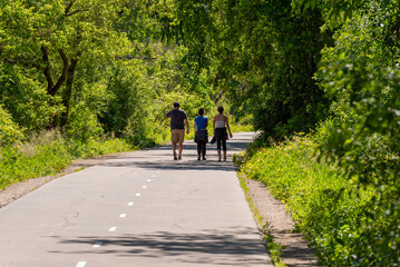 Walkers On The Fox River State Trail In Summer Near De Pere, Wisconsin