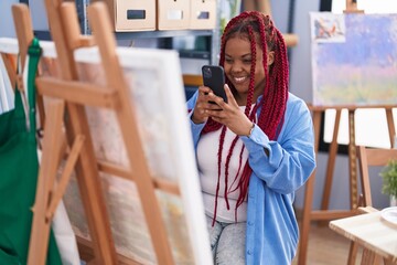 African american woman artist smiling confident make photo to draw at art studio