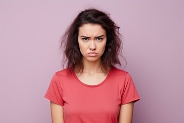 Fototapeta premium dissatisfied young woman a sad, tired and upset woman