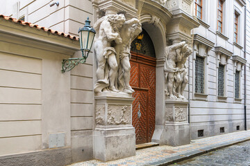 Ancient sculptures in the architecture of the city. Historical and cultural heritage. Background.