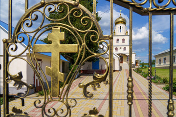 Cross as a religious symbol of Christianity. Background with selective focus and copy space