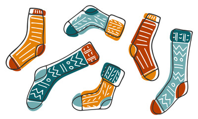 Set of warm socks. Hand drawn outline autumn, winter clothes. Warm seasonal accessories. Colorful clothing elements. Doodle line collection