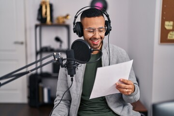 African american man artist singing song at music studio