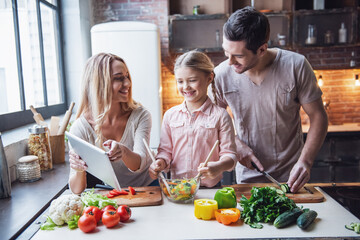 Young family cooking