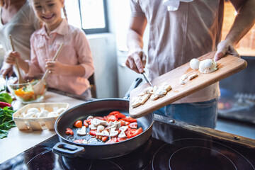 Young family cooking