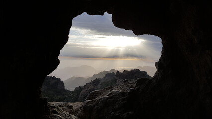 View of the mountains from a cave in Gran Canaria, Spain. - obrazy, fototapety, plakaty