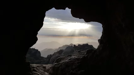 Fotobehang View of the mountains from a cave in Gran Canaria, Spain. © Picstocker