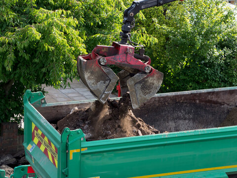 Europe, UK, england, London, grabber moving tarmac