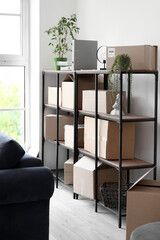 Shelving unit with parcels in living room