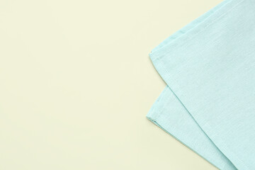 Clean folded napkin on color background