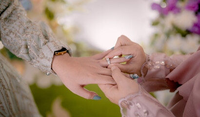 Fototapeta premium hands of the bride and groom