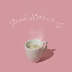 Fancy composition made of steaming coffee on pastel pink background with 