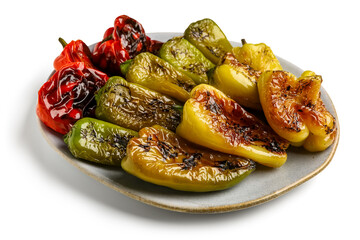 Plate with different grilled peppers on white background