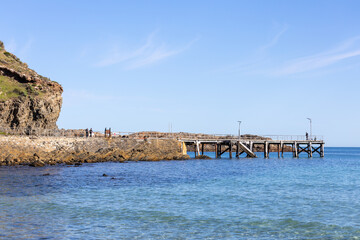 The iconic Second Valley jetty with turquoise waters on a calm sunny day located on the Fleurieu...