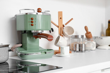 Coffee machine on white countertop in kitchen