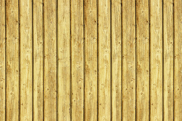 Yellow paint desk texture. Wooden wall background. Color vintage wood pattern. Rustic board with knots. Old peeling paint texture. Grunge cracked wooden wall background. Yellow color weathered surface