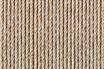 Rope texture. Brown old rope lines. Striped pattern. Retro textile texture. Stripes background on canvas. Twine pattern.