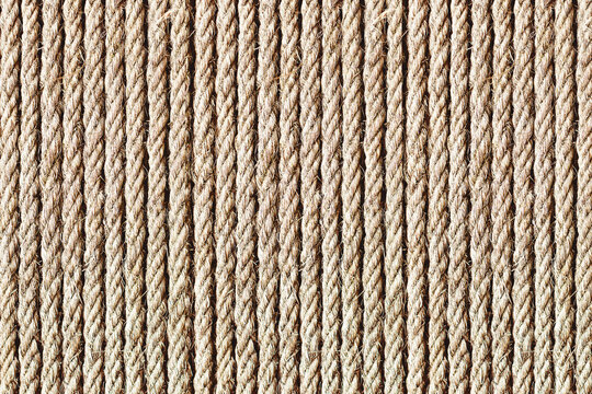 Rope texture. Brown old rope lines. Striped pattern. Retro textile texture. Stripes background on canvas. Twine pattern.