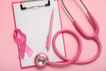 Pink ribbon with stethoscope and clipboard on color background. Breast cancer awareness concept