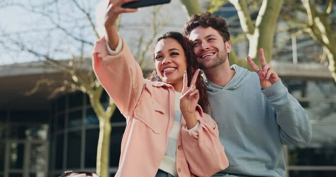 Selfie, peace sign and a couple at college posing for a picture together as a memory on university campus. Love, education or photography with a man and woman student laughing for study or growth