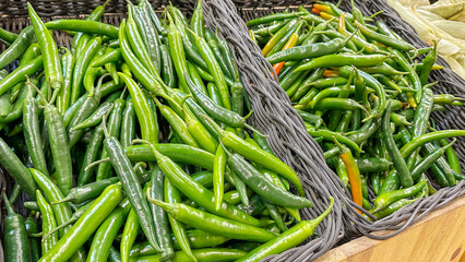 fresh green hot pepper on the counter