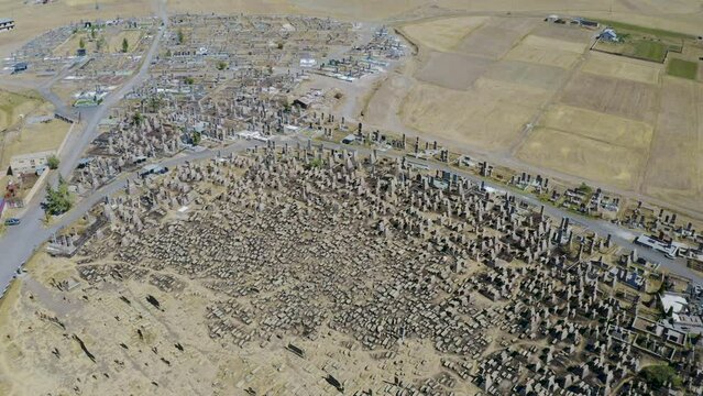 Aerial footage of Noratus cemetery on sunny summer day. Gegharkunik Province, Armenia.