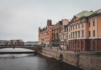 A bridge over a river in a city