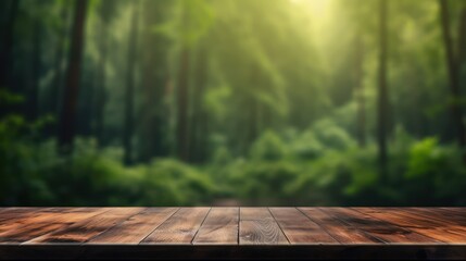 Empty wood table top with on blurred dark green forest. Wooden product mockup.